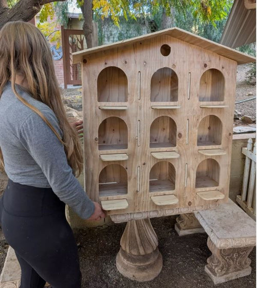9-hole pigeon nesting box showing individual nesting compartments